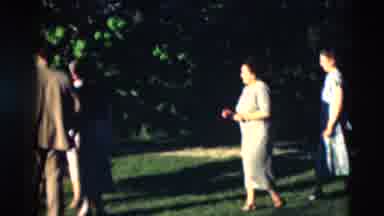 Paducah Kentucky USA (1951): Several Women And Two Men On A Green Lawn Surrounded