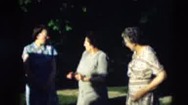 Paducah Kentucky USA (1951): Three Women Wearing Dresses Standing Outside Talking