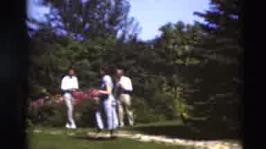 Paducah Kentucky USA (1951): Group Of People Walking Near Garden Wearing Sunday