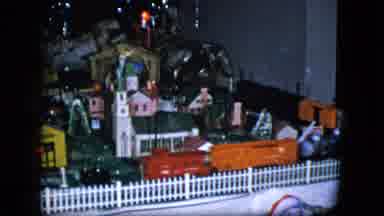 Cleveland Ohio (1951): Toy Train Going Around A Community Filled With Toy