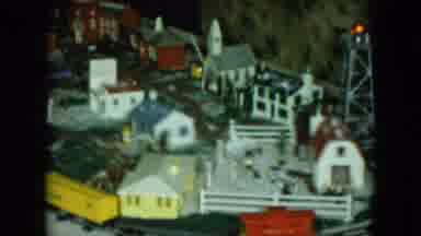 Cleveland Ohio (1951): Small Model Train Running On Tracks That Go Around A Tiny