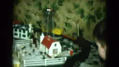 Cleveland Ohio (1951): Child Watching A Small Model Train Going Around A Adorable