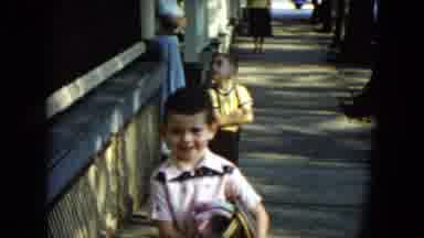 Cleveland Ohio (1951): Boys Walking Down The Street With Their Mother In The