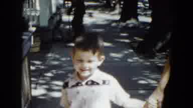 Cleveland Ohio (1951): A Boy Walking Down The Street With His Mom