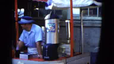 Cleveland Ohio (1951): Man In Blue Shirt And Hat Selling At Booth Drinks