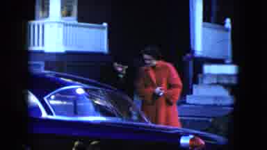 Cleveland Ohio (1951): A Man And A Woman Bend Down To Talk To Person In Car