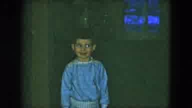 Cleveland Ohio (1951): Small Boy With Short Hair And Wearing A Blue Pajama Top