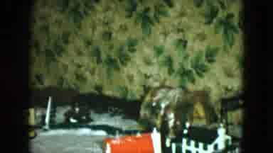 Cleveland Ohio (1951): Small Toy Model Train Driving Around Miniature Town On