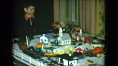 Cleveland Ohio (1951): Baby Lying On A Blanket And Then Probably Playing Train