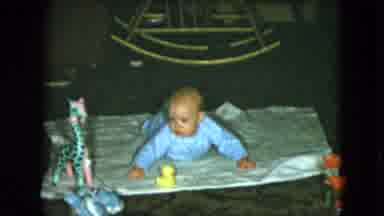 Cleveland Ohio (1951): The Cute Little Baby Was Lying On The Bed Surrounded With