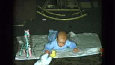 Cleveland Ohio (1951): Child Plays On His Stomach In The Living Room With Toys
