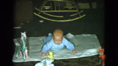 Cleveland Ohio (1951): A Little Baby Laying Down Enjoying Their Surroundings