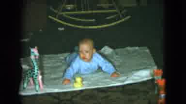 Cleveland Ohio (1951): Baby On A Blanket On The Floor For Tummy Time Joined By A