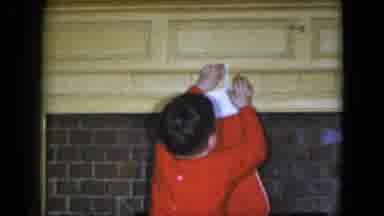 Cleveland Ohio (1951): Little Boy At Christmas Hangs A Stocking On The Fireplace