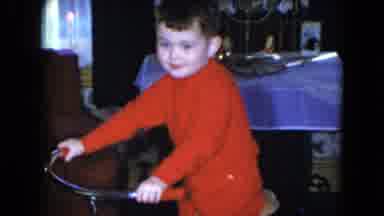 Cleveland Ohio (1951): Child Riding A Bicycle Indoors