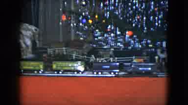 Cleveland Ohio (1951): Model Train Running Under A Revolving Christmas Tree And