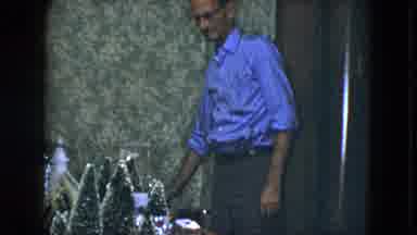 Cleveland Ohio (1951): Man Preparing Decoration During Family Dinner Celebrating
