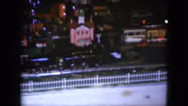 Cleveland Ohio (1951): Toy Train Passing Next To Small Toy Village And Making Turn