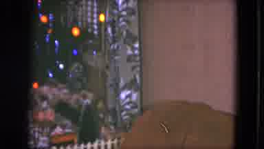 Cleveland Ohio (1951): Toy Model Train On Track Goes Under Christmas Tree With
