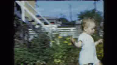 Cleveland Ohio (1951): Small Child Running Outside In The Grass Playing With A Red