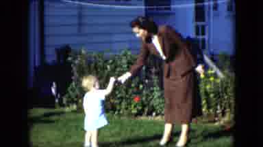 Cleveland Ohio (1951): A Lady Gives A Little Girl A Snack