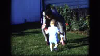 Cleveland Ohio (1951): The Little Child Is Playing A Ball Game For Her Father Very