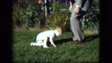 Cleveland Ohio (1951): A Little Child Playing In The Garden With Him Father They