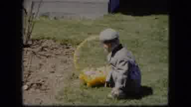 Cleveland Ohio (1951): Little Boy Admiring The Contents Of His Big Yellow Easter