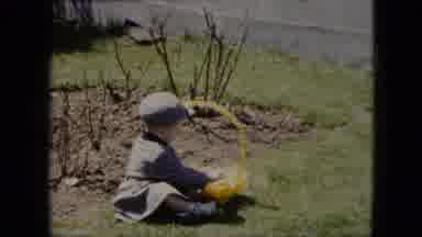 Cleveland Ohio (1951): A Little Boy PalauâS Outside With His Easter Basket In A