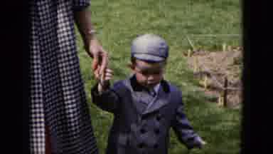 Cleveland Ohio (1951): Little Boy Strolls Outside The House On A Nice Sunny Day On