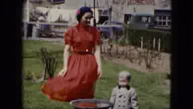 CLEVELAND OHIO-1951: Strong Wind While Mother and Child Walk