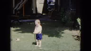 Cleveland Ohio (1951): Little Boy Amazed As He Plays With The Water Hose
