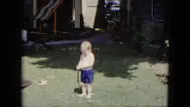 Cleveland Ohio (1951): In The Sunny Grass In The Front Of A House A Little Toddler