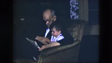 Cleveland Ohio (1951): Sweet Older Gentleman Reading The Paper To A Small Child