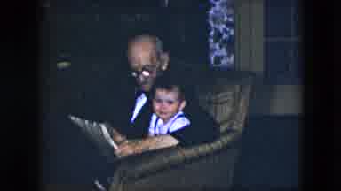 Cleveland Ohio (1951): Grandpa Spending Quality Time With His Grandson Reading