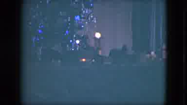 Cleveland Ohio (1951): Toy Train Circles A Christmas Tree With Silver Tinsel