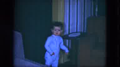 Cleveland Ohio (1951): A Little Boy Slowly Walking And Posing For The Camera