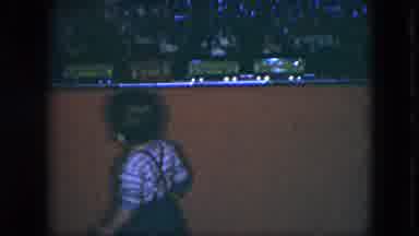 Cleveland Ohio (1951): Son Plays With Train During Christmas With His Dad And Toys