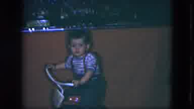 Cleveland Ohio (1951): Toddle White Boy On A Red Tricycle Inside Near Table
