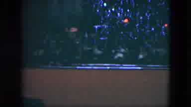 Cleveland Ohio (1951): Small Working Model Train Making Laps Underneath A Colorful