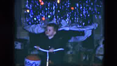 Cleveland Ohio (1951): Small Boy Sits On Tricycle In Front Of Christmas Tree On