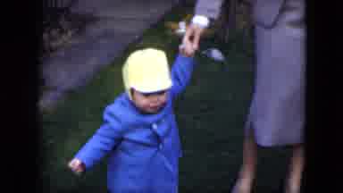 Cleveland Ohio (1951): Mother Wearing A Brown Coat And Skirt Walking Baby Around