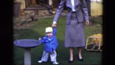 Cleveland Ohio-1951: Woman Walking Child In Backyard