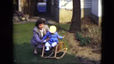 Cleveland Ohio (1951): Mom And Toddler Show Off New Rocking Toy On Beautiful Fall