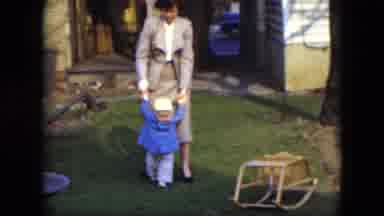Cleveland Ohio (1951): Toddler Showing Off First Steps With Help From Mom In