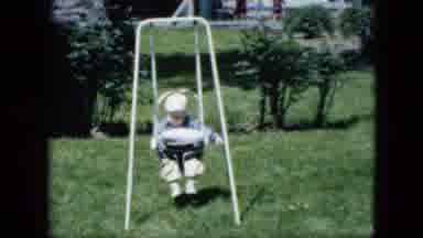 Cleveland Ohio (1951): Adorable Sleepy Baby Slowly Falling Asleep As He Rocks In A