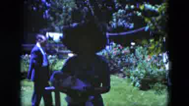 Cleveland Ohio (1951): Woman Walks Happily With A Newborn Baby Outside The House