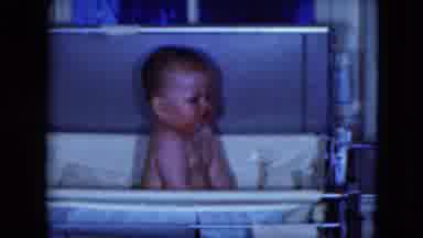 Cleveland Ohio (1951): Baby In Bathtub Splashing Water