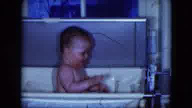 Cleveland Ohio (1951): Baby Splashing In Water Sitting In Sink Talking Smiling
