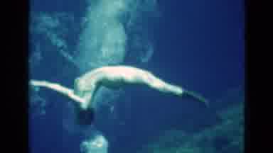 Florida USA (1952): Woman Swimming In Underwater World Wearing Snorkeling Mask